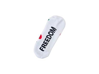 Unterseite der weißen Freedom Socken mit schwarzem Schriftzug
